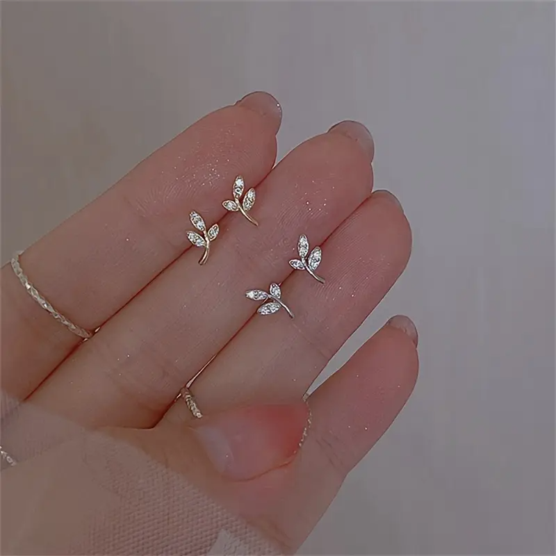 1195 Ohrringe mit Olivenzweig-Design - Gelbgold-Optik mit Zirkonia, nickelfrei, ideal für Alltag & Urlaub, elegante Ohrringe | Zirkonia-Ohrringe