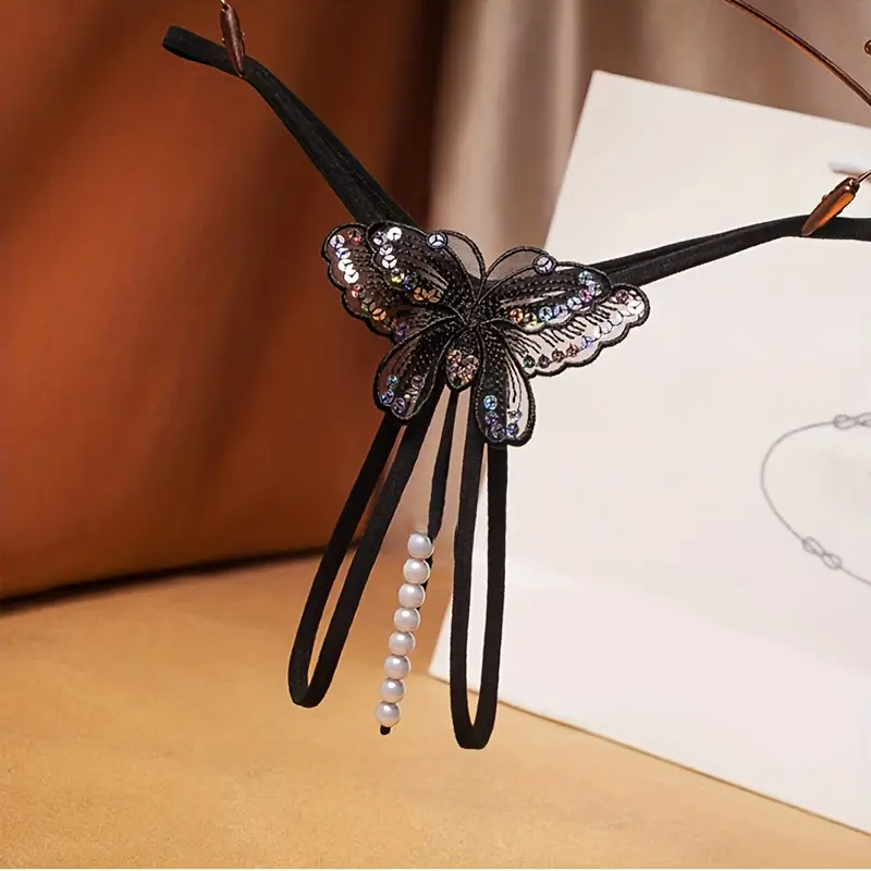 Dessous für modebewusste Frauen mit offenem Schritt und Schmetterlingsdesign, ideal für schlanke Personen