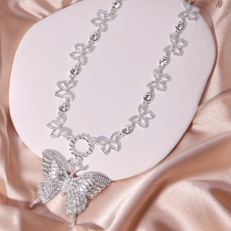 Kubanische Halskette voller Strasssteine, großer Schmetterling, handgefertigt, versilberter Halsschmuck für Frauen